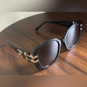 Chanel black quilted logo sunglasses w/ gold-toned logo & quilted detailing!